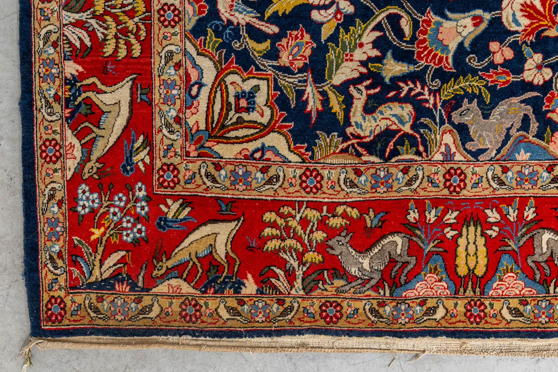 An Oriental, hand made carpet decorated with &quot;Fauna and Flora&quot;. (L: 320 x W: 223 cm) - Image 8 of 9