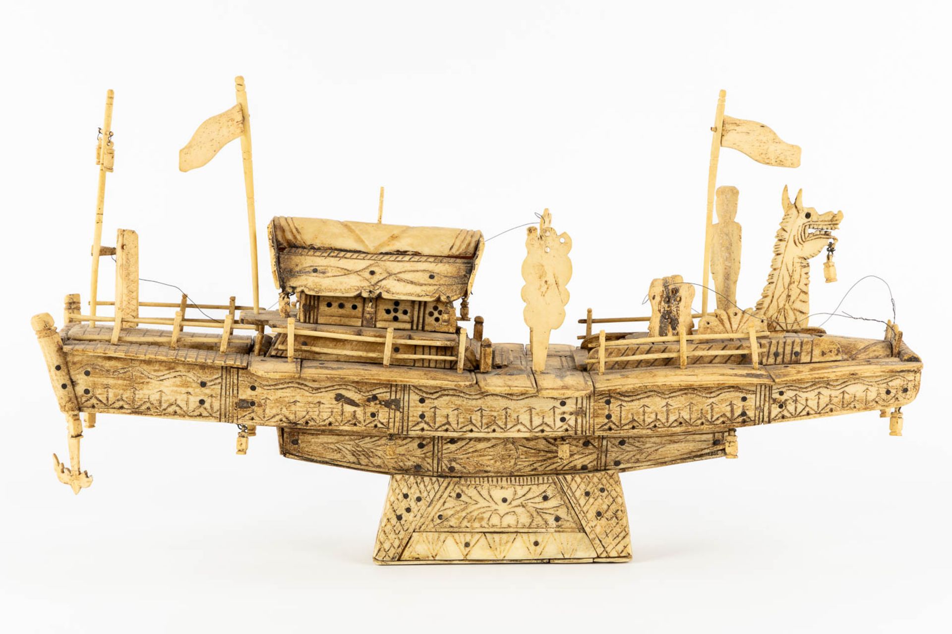 An antique Chinese model of a ship, sculptured bone. Circa 1900. (L:13 x W:50 x H:28 cm) - Image 5 of 11