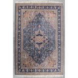 An Oriental hand-made carpet. Serapi. (L:282 x W:194 cm)