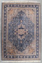 An Oriental hand-made carpet. Serapi. (L:282 x W:194 cm)