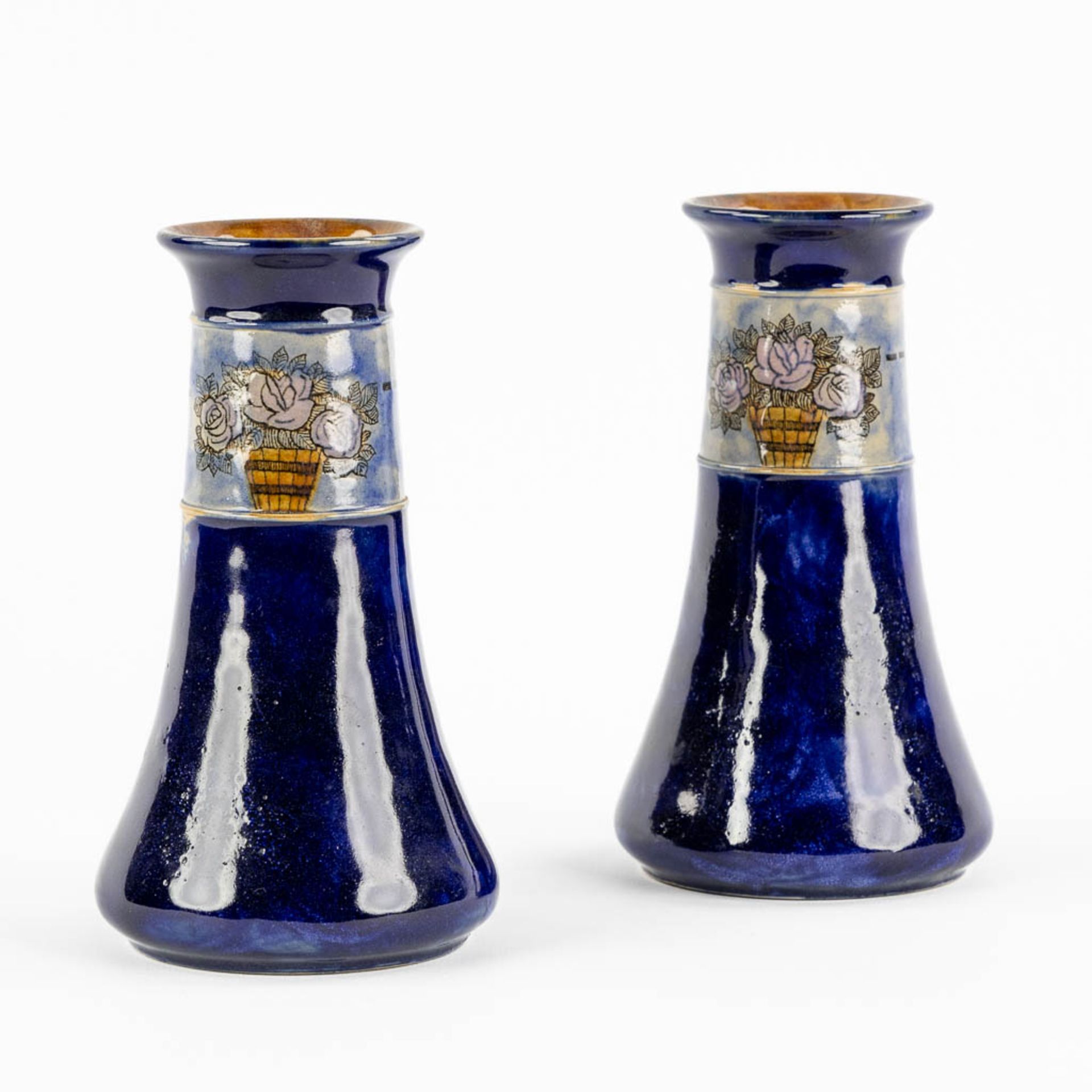 Royal Doulton, a pair of blue-glaze stoneware vases, Art Nouveau. (H:18 x D:10 cm)