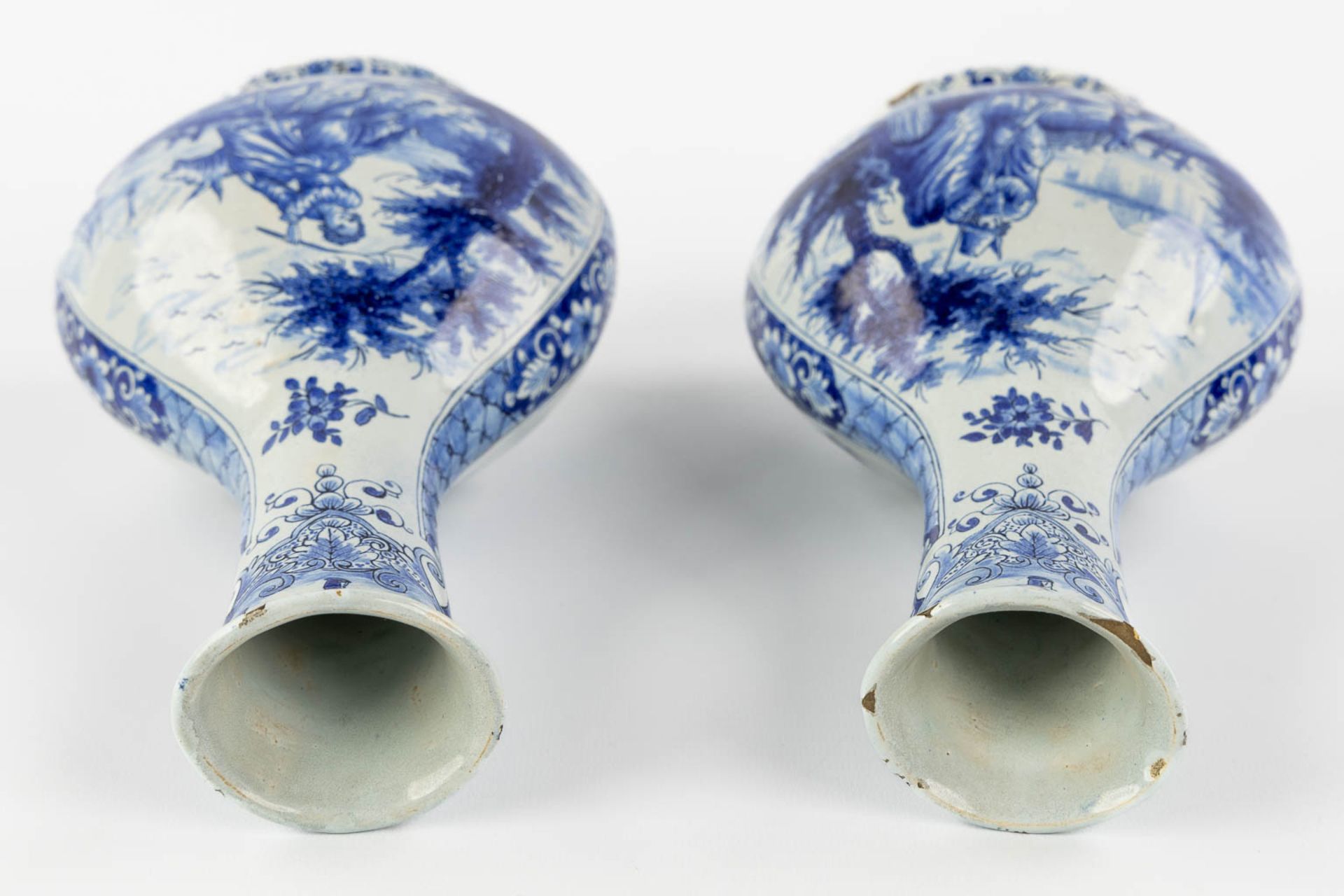 Geertrui Verstelle, Delft, a pair of vases with a landscape decor. Mid 18th C. (L:9 x W:14 x H:26,5 - Image 9 of 15