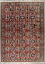 An Oriental hand-made carpet, Hereke. (L:335 x W:240 cm)