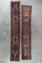 Two Oriental hand-made runners. (L:396 x W:67 cm)