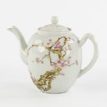 A Chinese Famille Rose teapot with a floral decor and calligraphy. 19th/20th C. (L:12 x W:21 x H:16