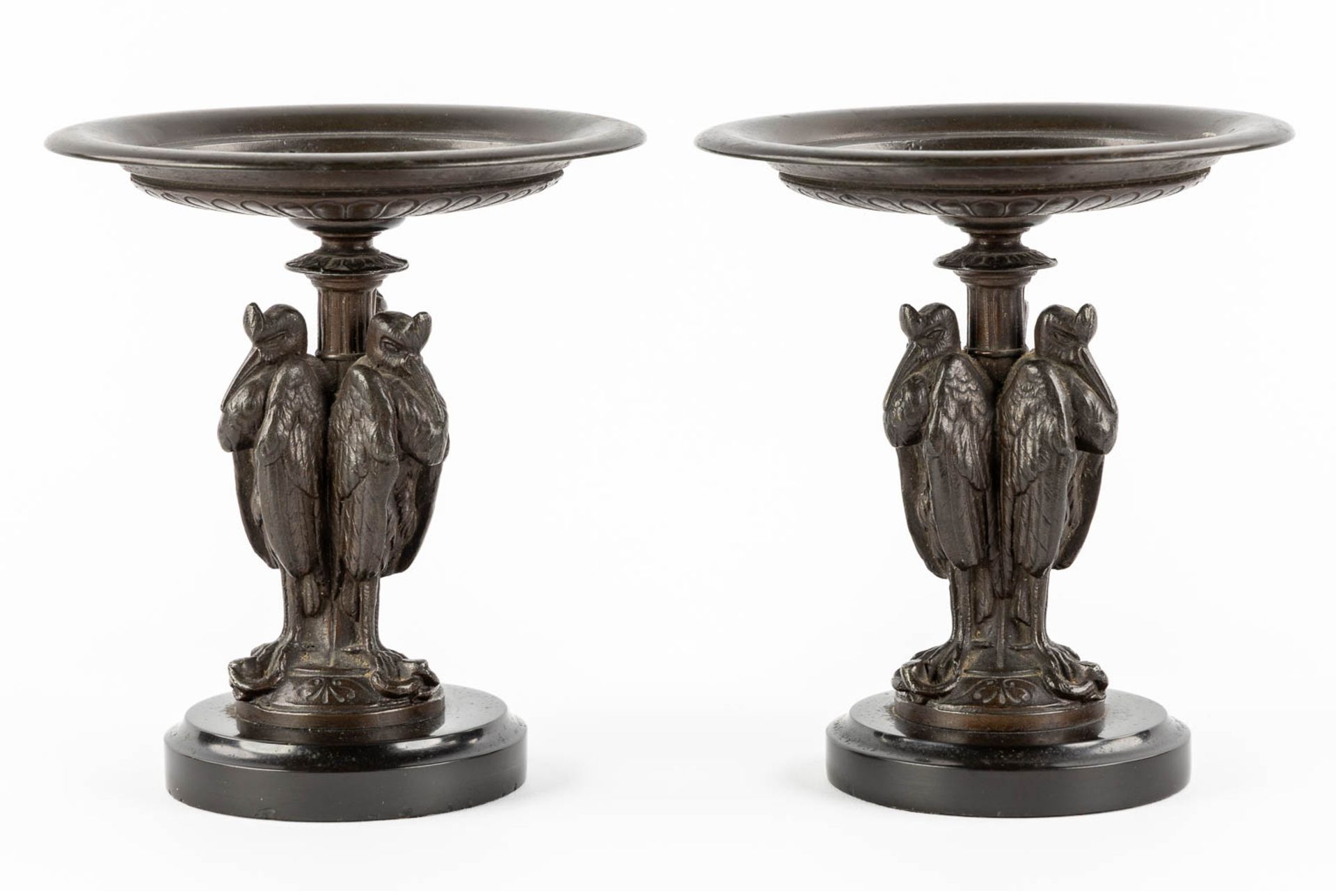 A pair of antique tazza, decorated with African Marabou holding a snake. Patinated spelter. (H:17 x - Image 5 of 10