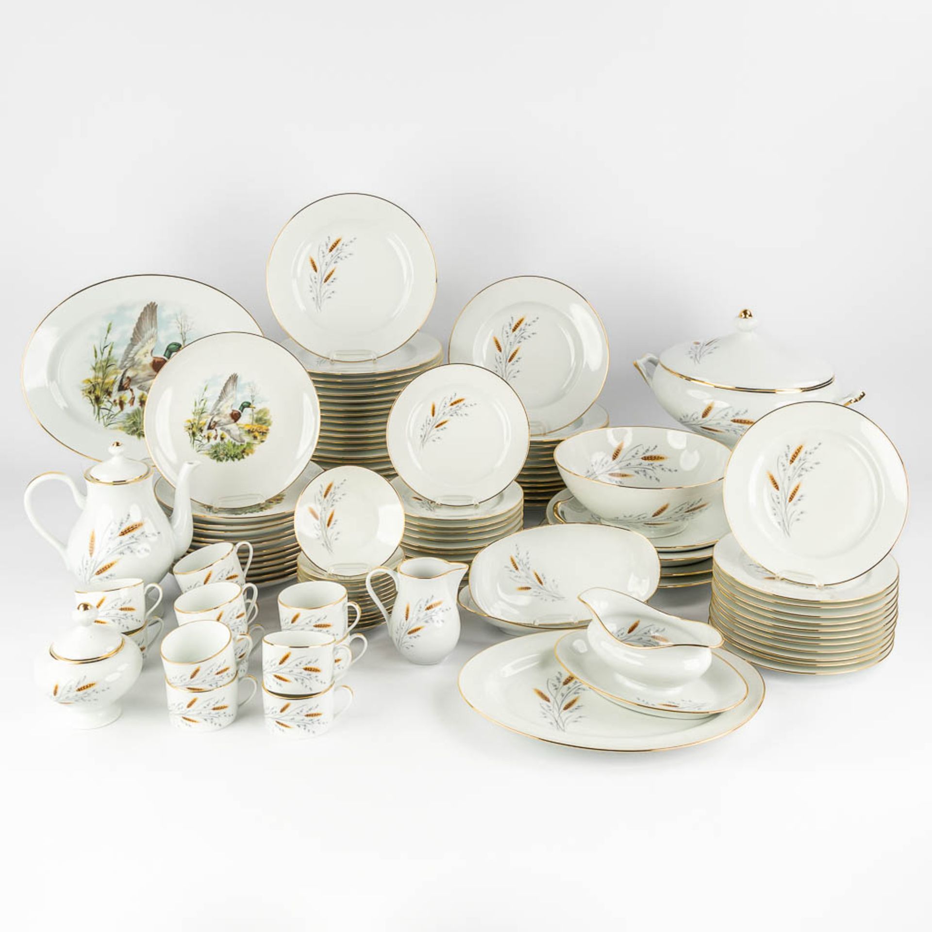 Limoges, France, a large, 12-person dinner, wild and coffee service. (L:23 x W:34 x H:22 cm)