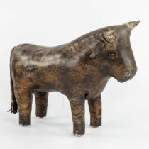 Dimitri OMERSA (1927-1975) 'Bull' leather footstool. (L:32 x W:58 x H:50 cm)