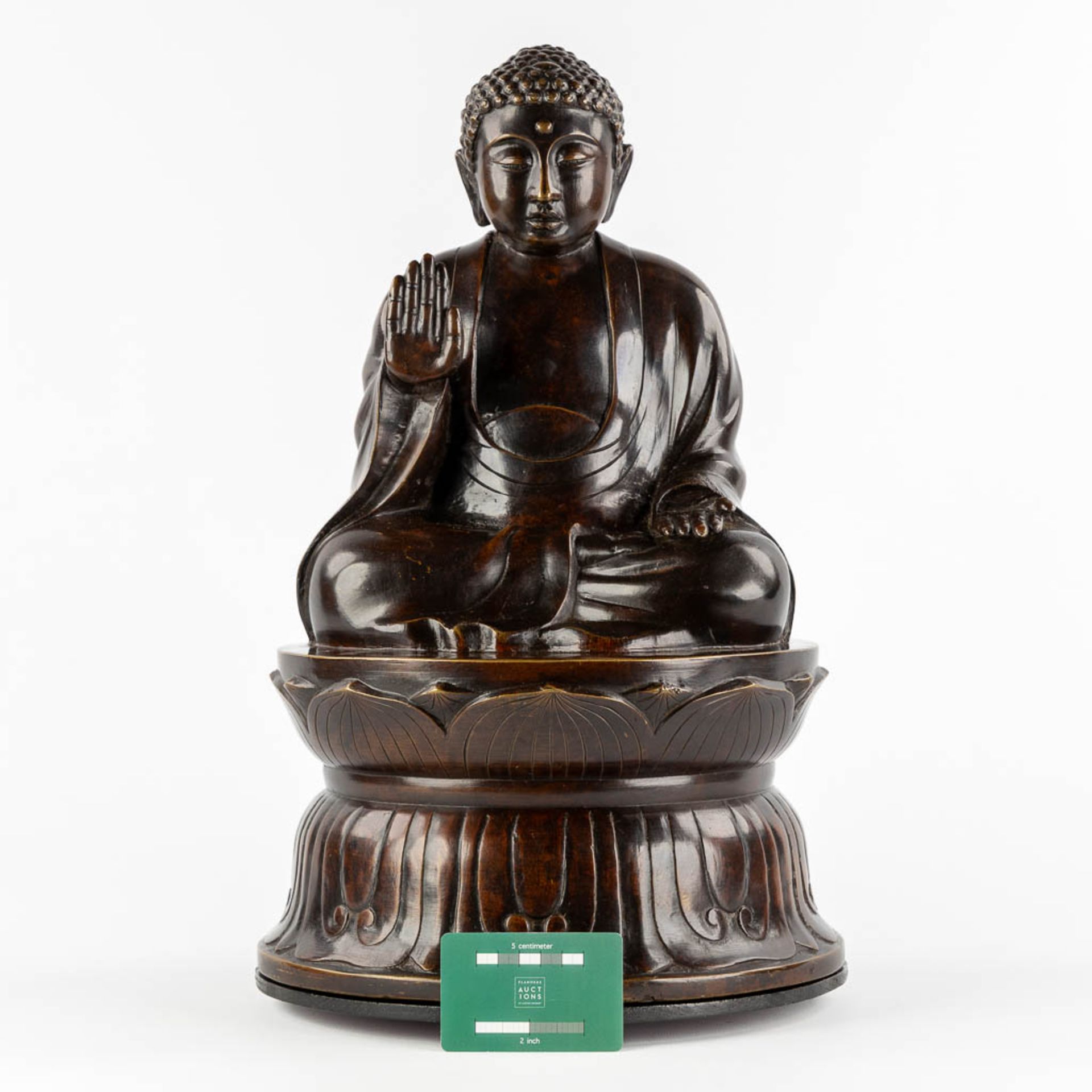 A Buddha seated on a lotus flower, patinated bronze. (H:50 x D:30 cm) - Image 2 of 10