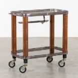 A high-quality serving cart, silver plated metal on wood. Circa 1940. (L:46 x W:84 x H:83 cm)