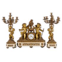 Vauvray, an exceptional gilt bronze and white marble garniture clock and candelabra. France, 19th C.