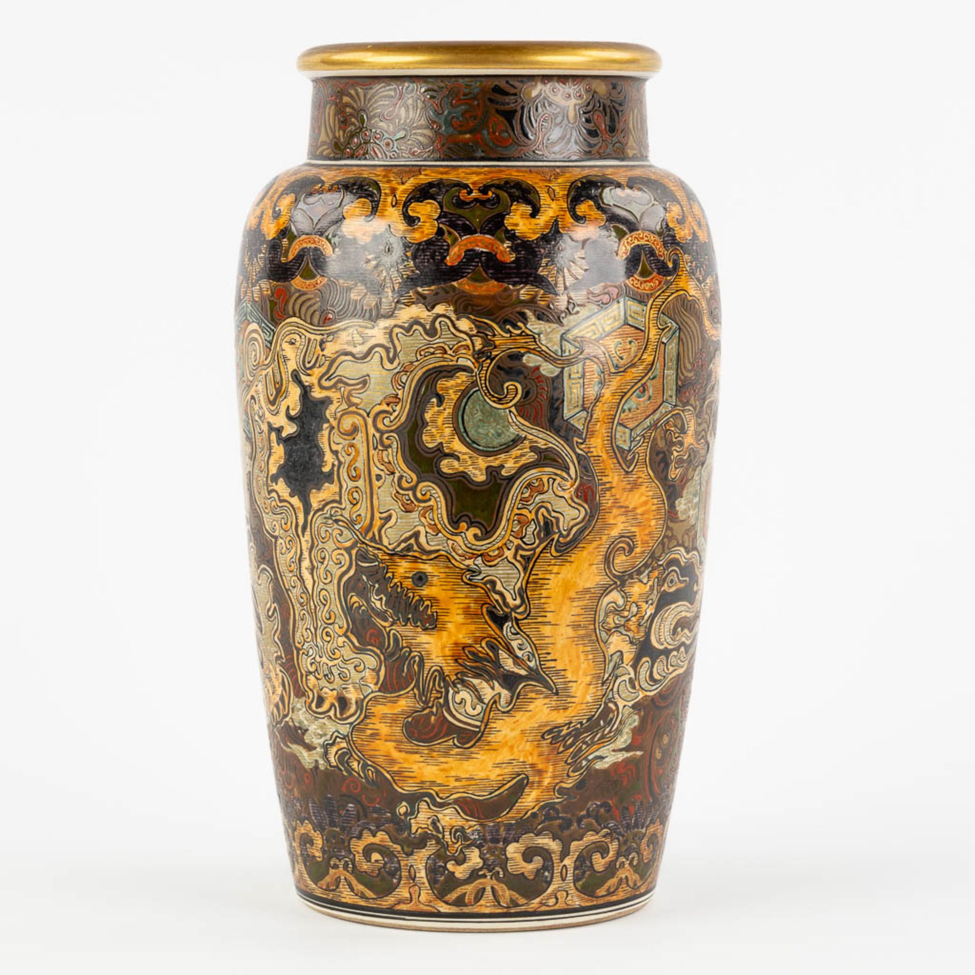 A decorative Japanese vase with a dragon decor. Glazed faience. (H:31 x D:18 cm)