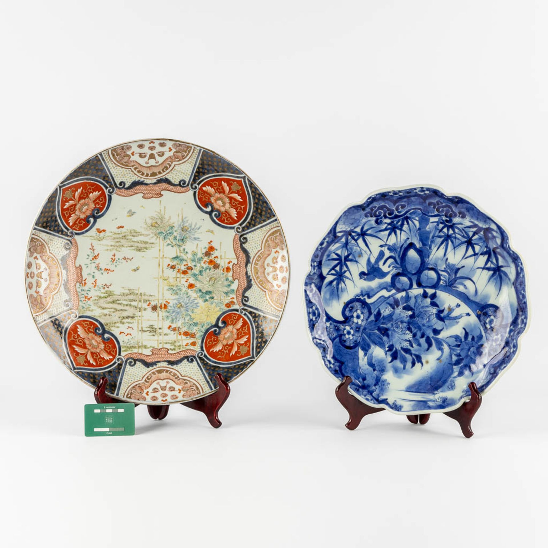 Two Japanese Imari and blue-white plates. 19th/20th C. (D:46 cm) - Image 2 of 14
