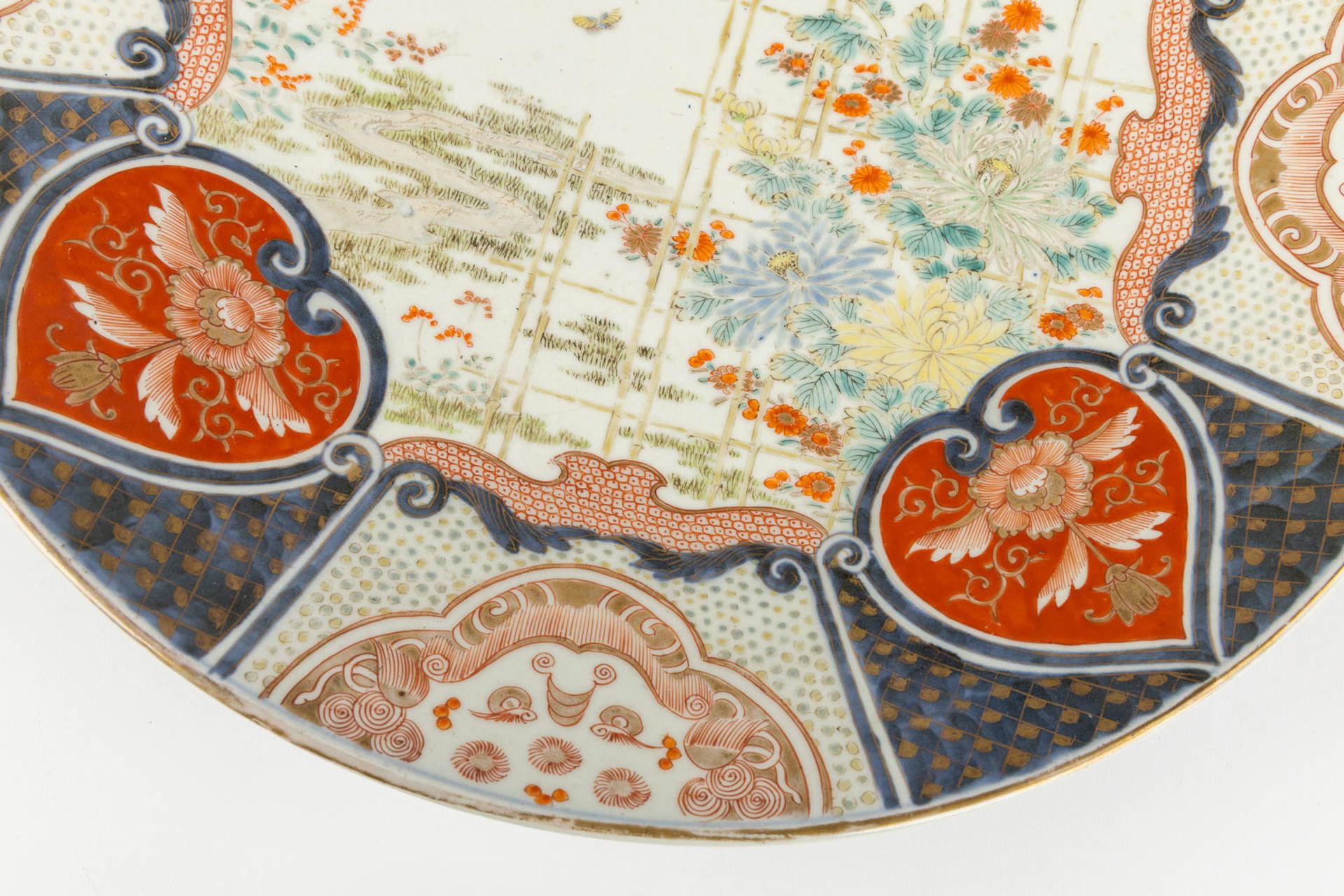 Two Japanese Imari and blue-white plates. 19th/20th C. (D:46 cm) - Image 6 of 14