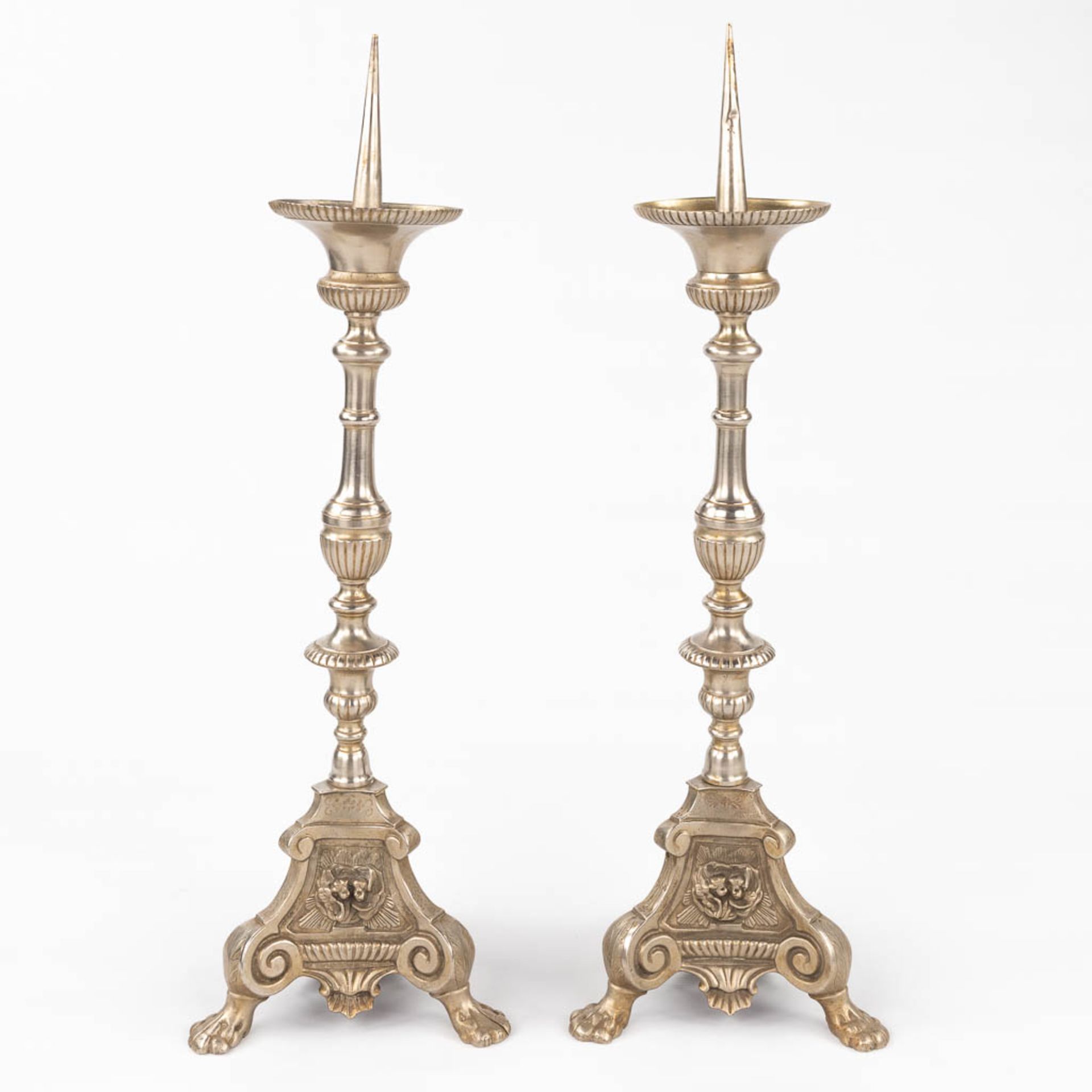 A pair of silver-plated church candlesticks. (H:70 cm)