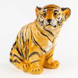 A decorative tiger cub, glazed ceramics. Italy, circa 1980. (L:27 x W:47 x H:44 cm)