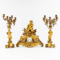 A three-piece mantle garniture, gilt bronze with hunting scènes. Signed Detouche. (L:17 x W:65 x H:5