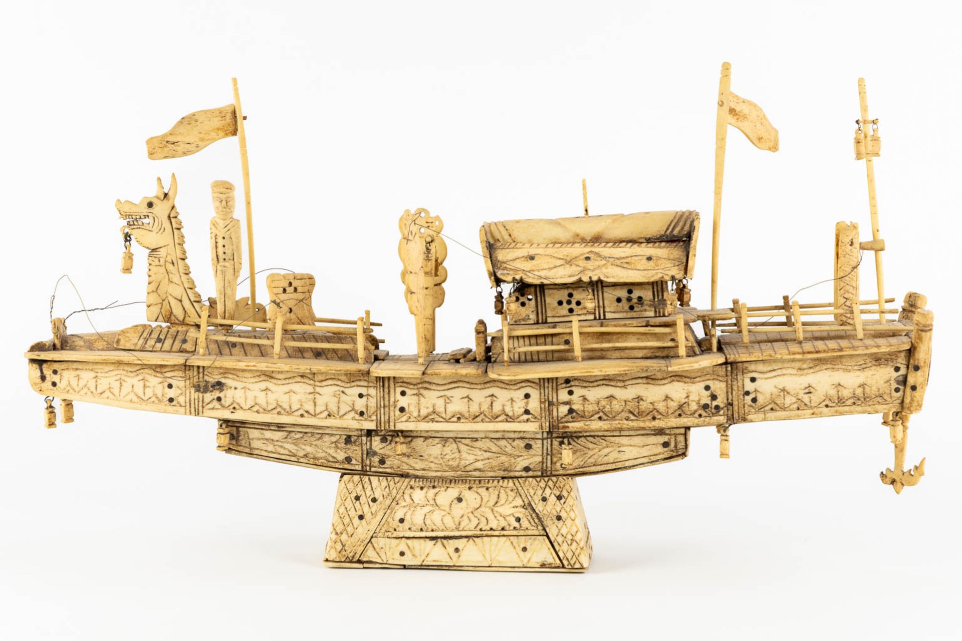 An antique Chinese model of a ship, sculptured bone. Circa 1900. (L:13 x W:50 x H:28 cm) - Image 3 of 11