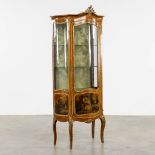 A display cabinet, veneer mounted with bronze in Louis XV style. 20th C. (L:45 x W:74 x H:180 cm)