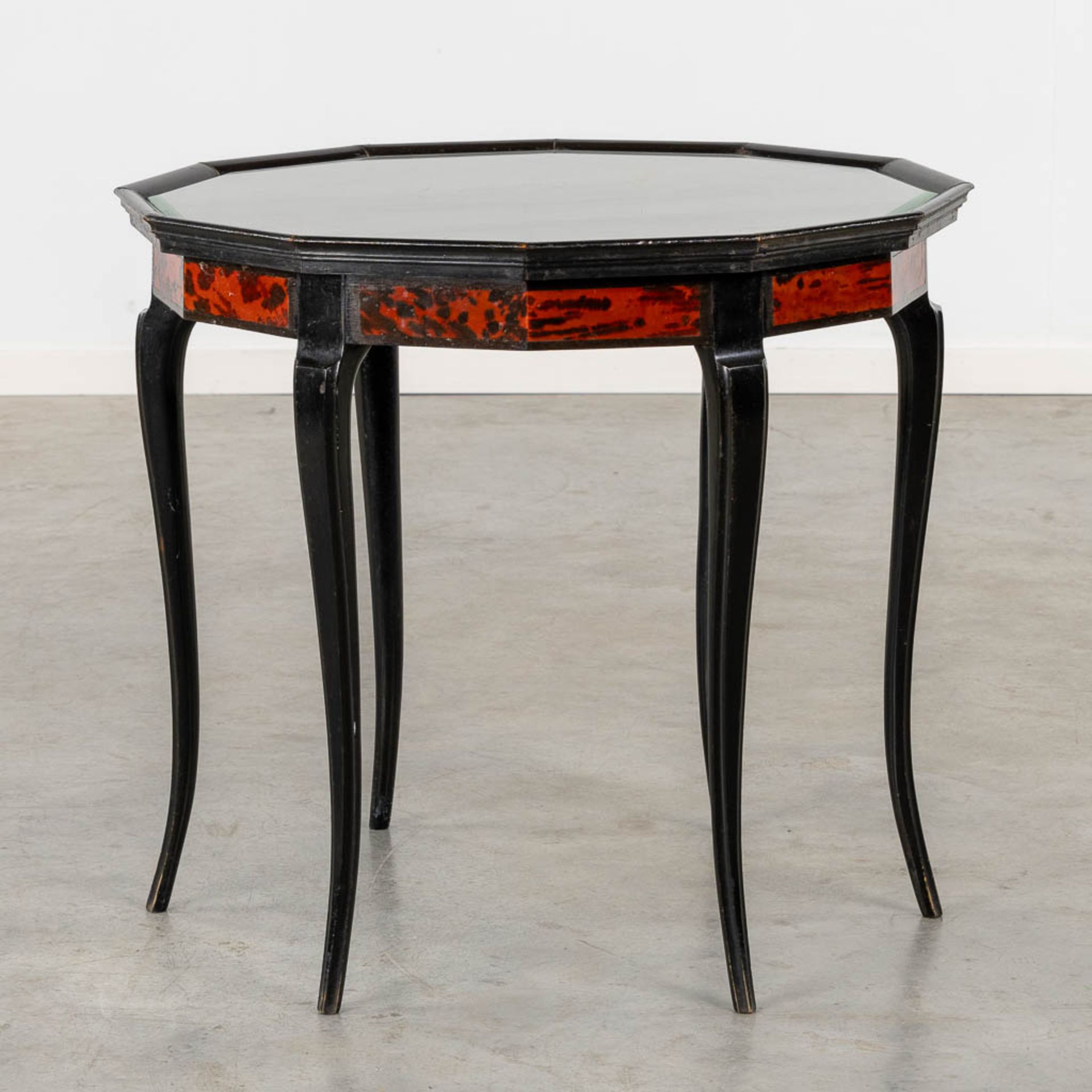 Maison Franck, Antwerp, an octagonal side table, tortoise shell and ebonised wood. (H:65 x D:72 cm) - Image 7 of 8
