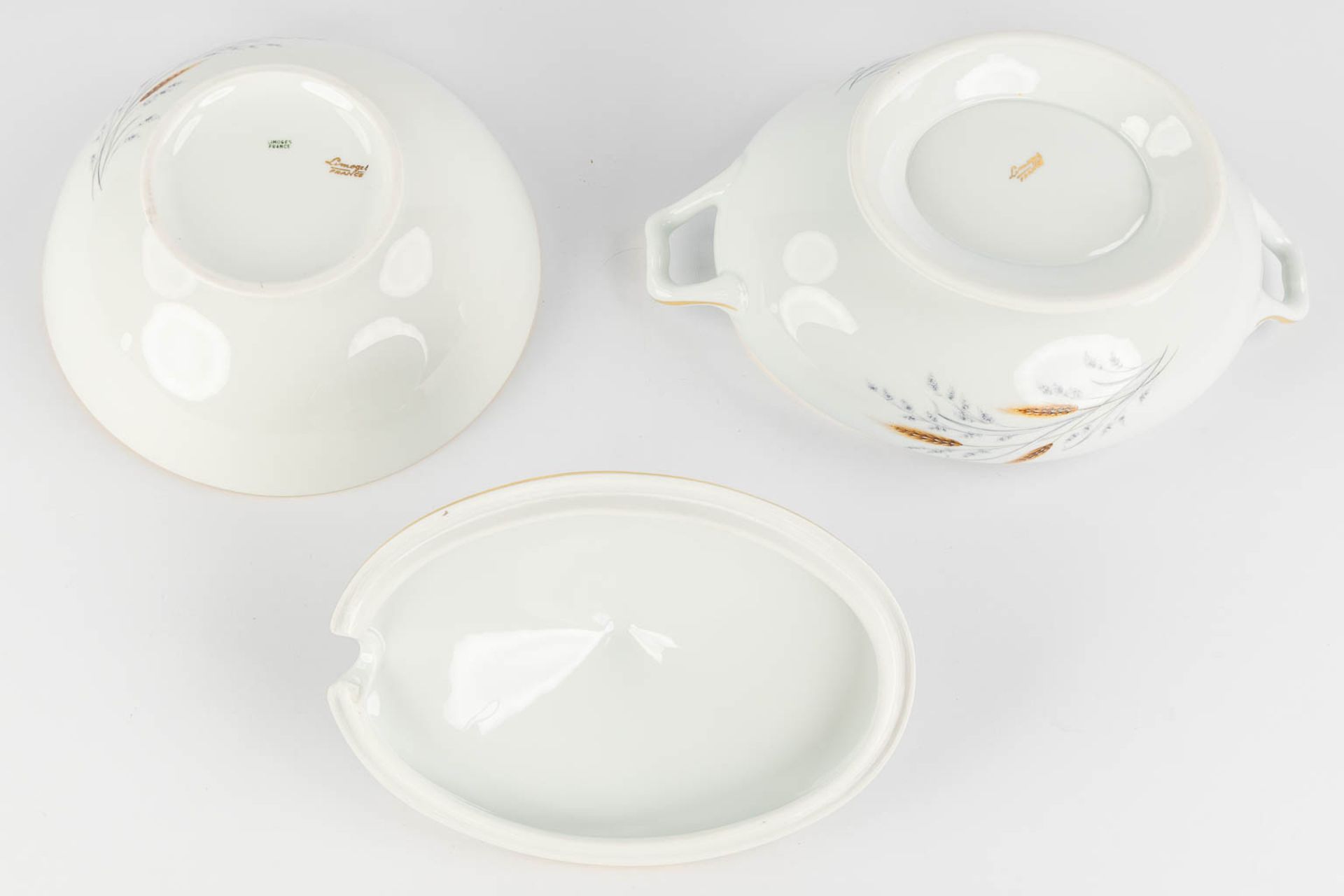 Limoges, France, a large, 12-person dinner, wild and coffee service. (L:23 x W:34 x H:22 cm) - Image 15 of 28