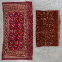 Two Oriental hand-made carpets, Bokhara. (L:163 x W:84 cm)