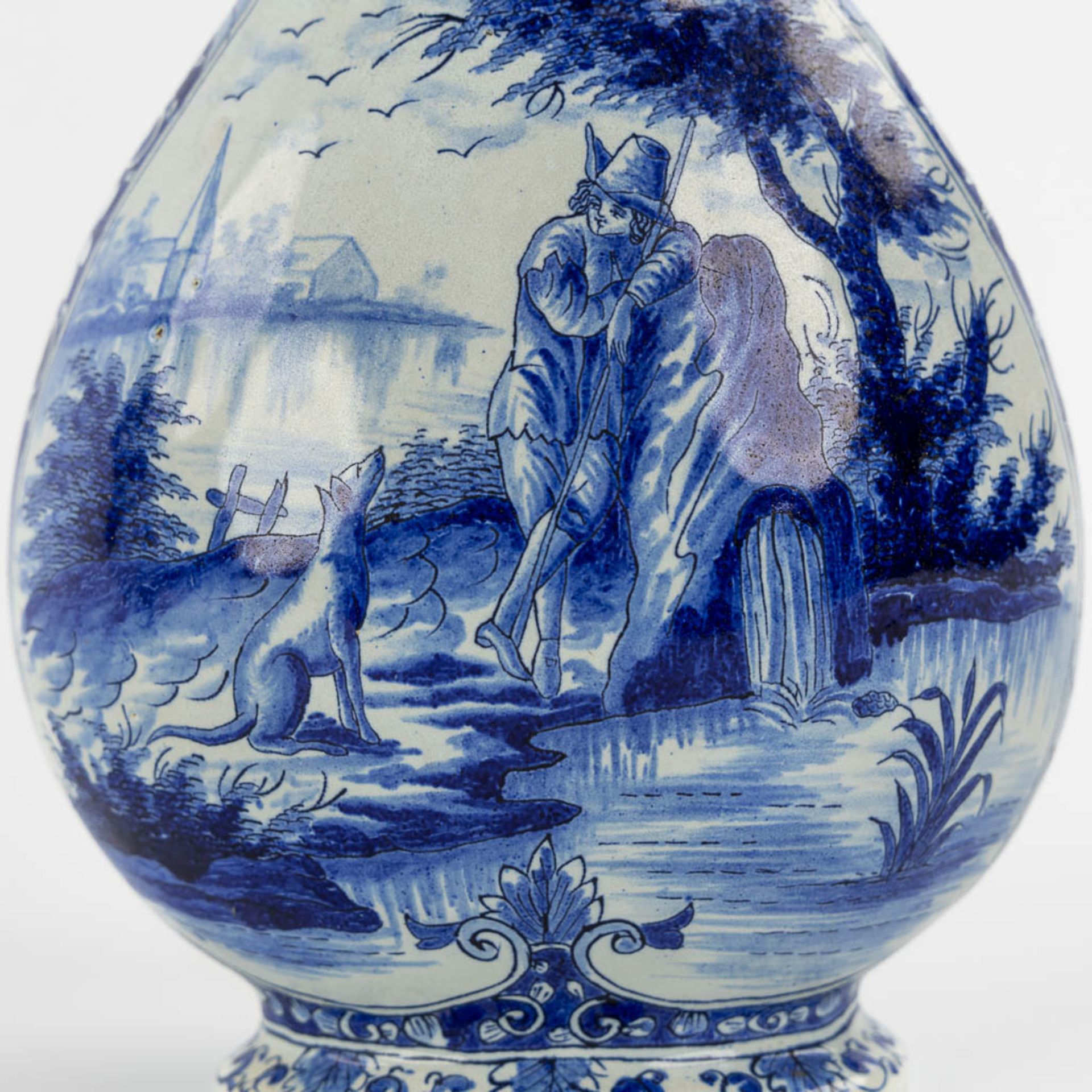 Geertrui Verstelle, Delft, a pair of vases with a landscape decor. Mid 18th C. (L:9 x W:14 x H:26,5 - Image 13 of 15