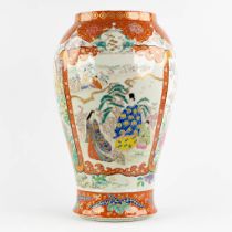 A large Japanese Kutani vase, decorated with fauna and flora. 19th C. (H:61 x D:38 cm)