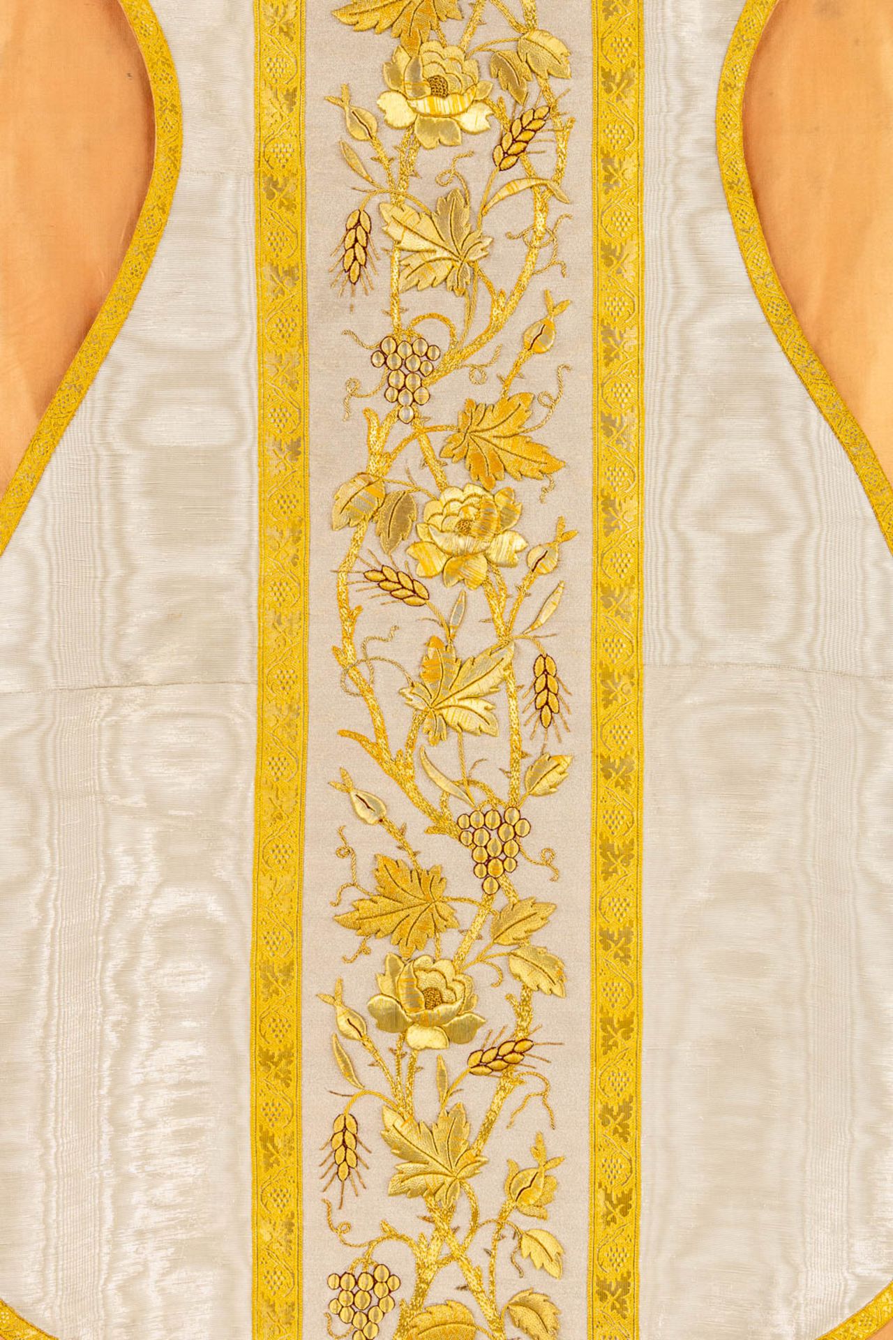 A Roman Chasuble, Thick gold thread brocade with floral decors and the Holy Grail. - Image 7 of 7