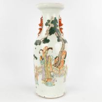A Chinese vase, decorated with ladies in the garden. 19th C. (H:60,5 x D:23 cm)