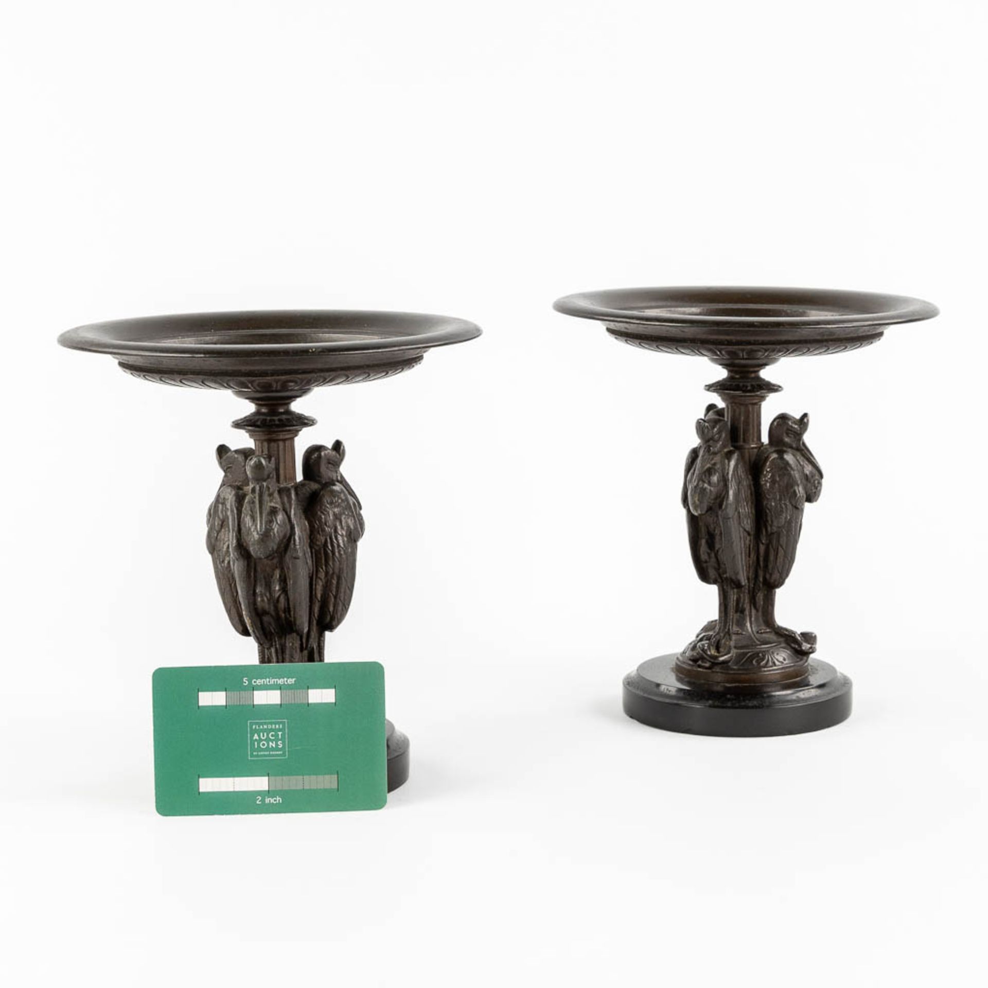 A pair of antique tazza, decorated with African Marabou holding a snake. Patinated spelter. (H:17 x - Image 2 of 10