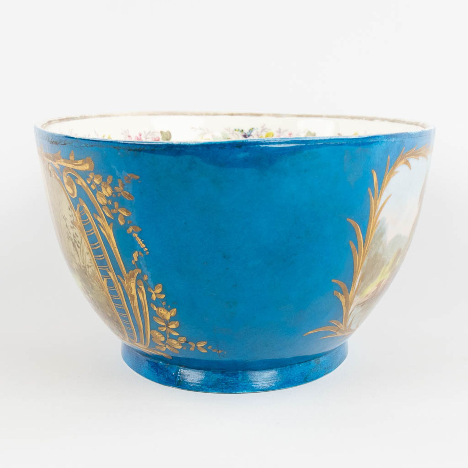 A large bowl, blue glaze with hand-painted decor, probably Limoges. (L:24 x W:39 x H:14 cm) - Image 6 of 12