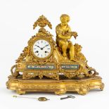 A mantle clock, gilt bronze finished with Sèvres porcelain plaques, 19th C. (L:16 x W:45 x H:35 cm)