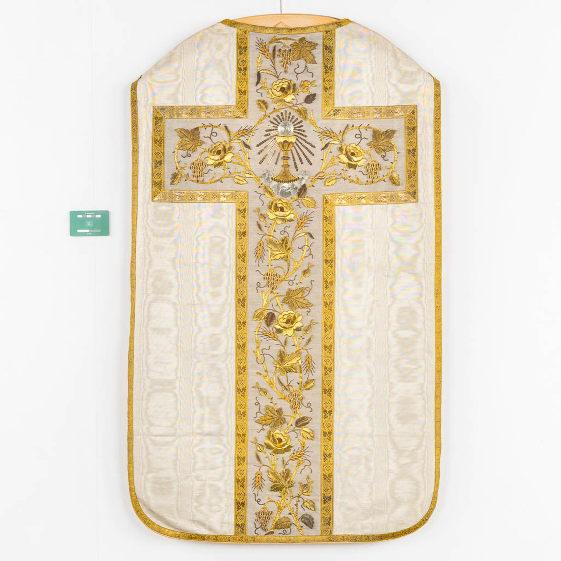 A Roman Chasuble, Thick gold thread brocade with floral decors and the Holy Grail. - Image 2 of 7