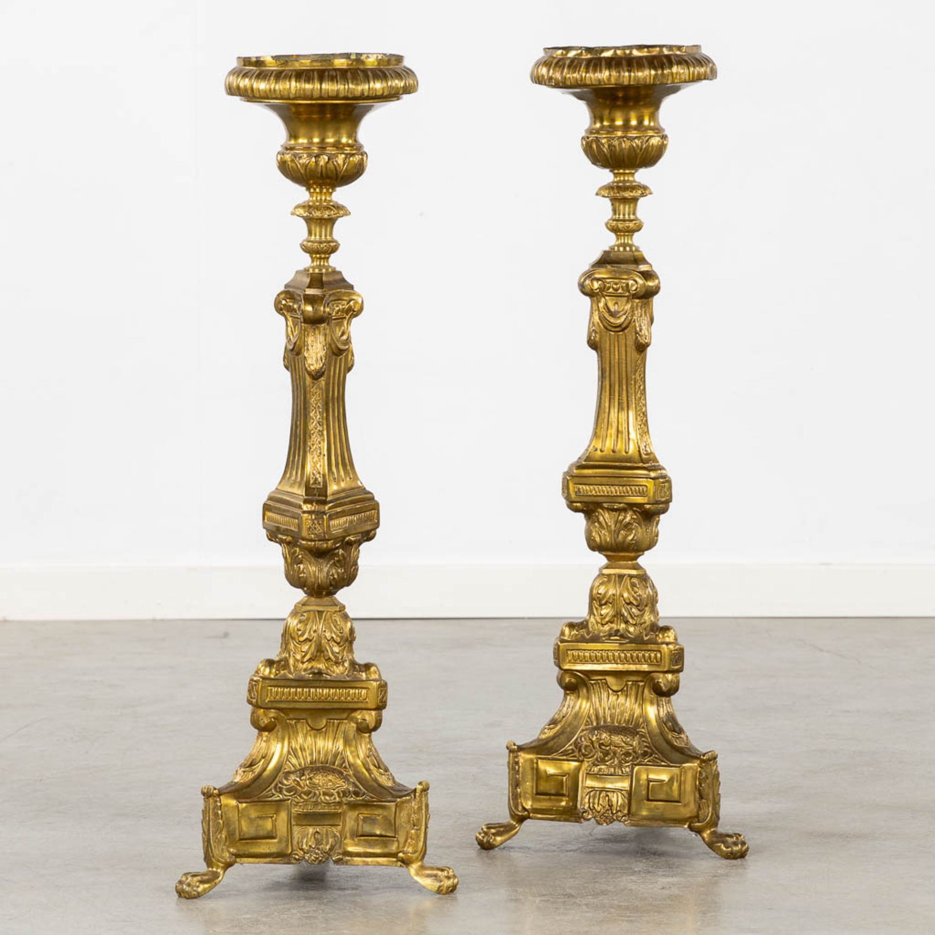 A pair of church candlesticks, brass. 19th C. (H:76 cm)