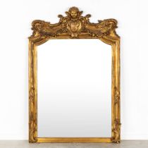 An antique mirror, gilt plaster in Louis XV style with an angel. Circa 1900. (W:110 x H:160 cm)