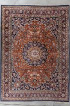 An Oriental hand-made carpet, Waramin (L:298 x W:203 cm)