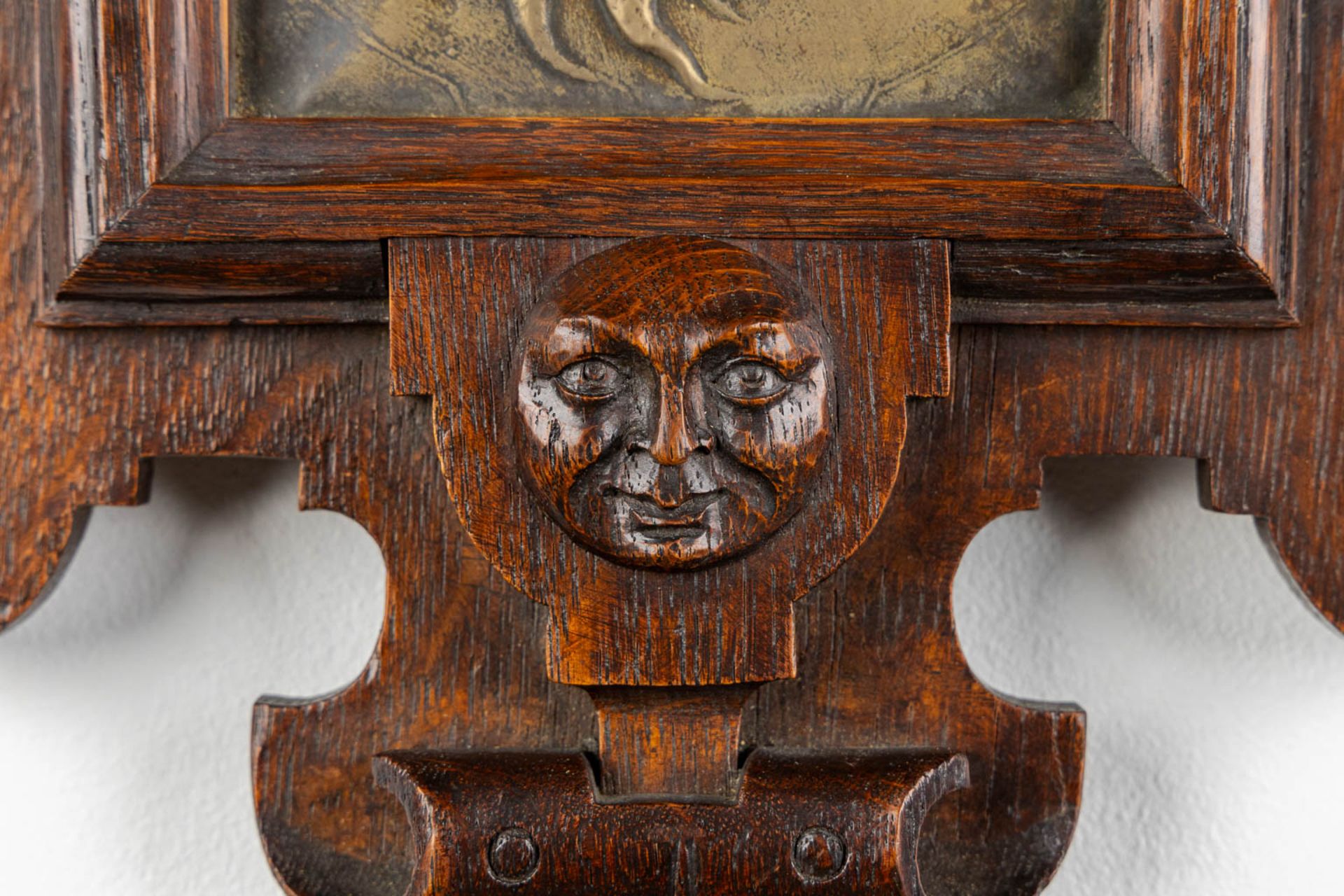 A wall-mounted clock, sculptured oak and repousse copper, decorated with putti and angels. 19th C. ( - Image 6 of 8