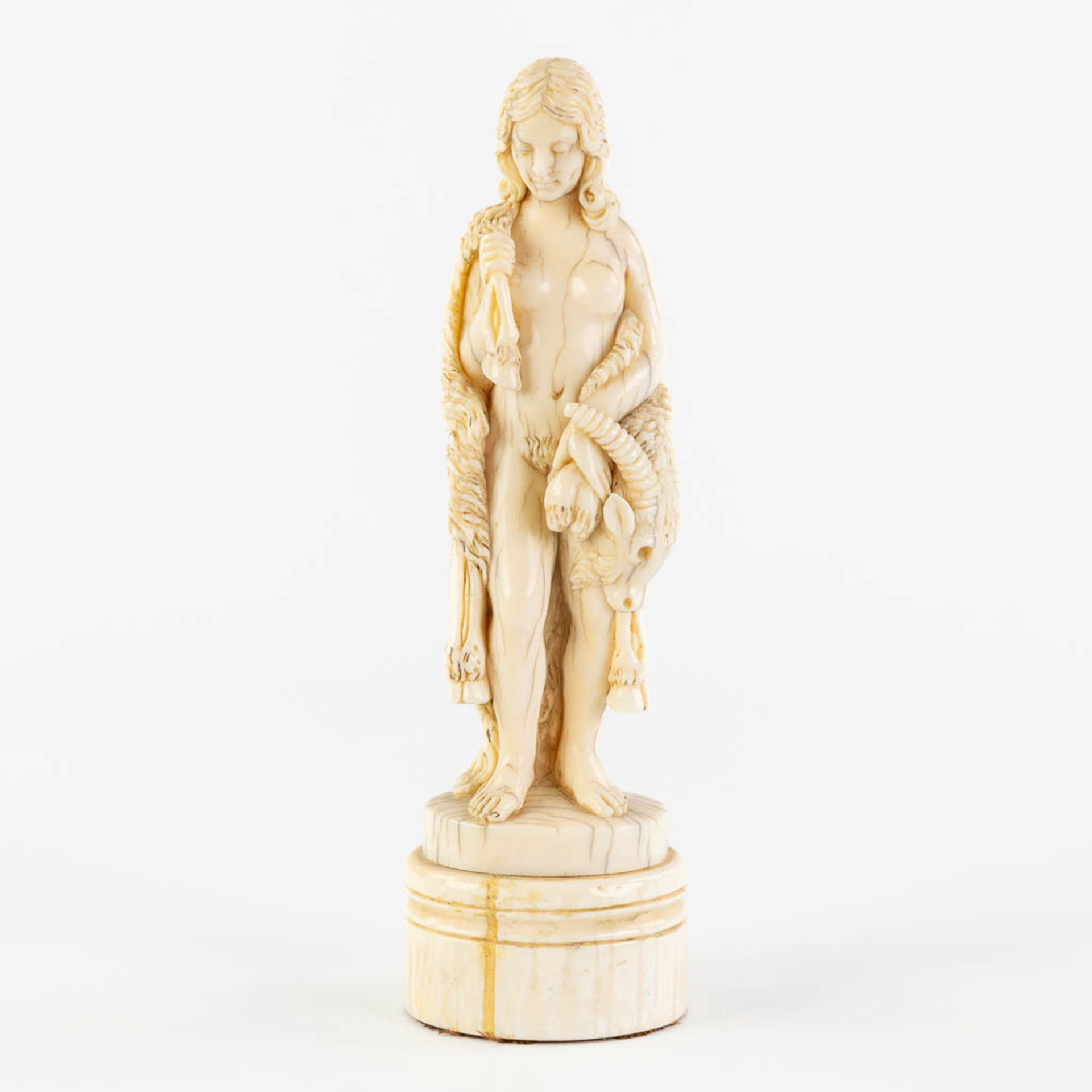 An antique figurine 'Eve in the garden of Eden', sculptured ivory. Dieppe, France, 19th C. (L:5 x W: