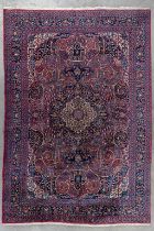 An Oriental hand-made carpet, Machad. (L:367 x W:256 cm)