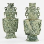 A Chinese pair of Jade sculptured vases with Foo Lion finials, 20th C. (L:16 x W:34 x H:74 cm)