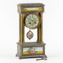 A mantle column clock, spelter embellished with porcelain plaques, Circa 1900. (L:11 x W:19 x H:37 c