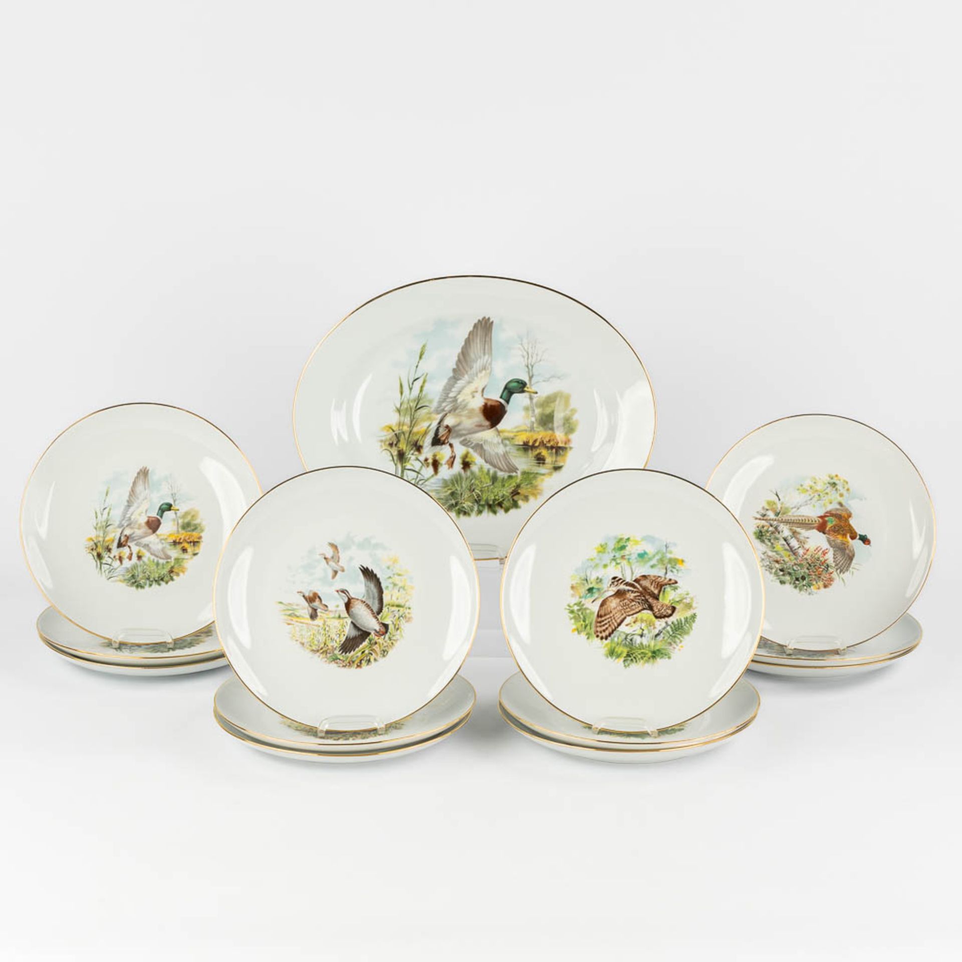 Limoges, France, a large, 12-person dinner, wild and coffee service. (L:23 x W:34 x H:22 cm) - Image 19 of 28