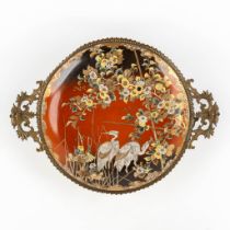 A Japanse bowl, bronze mounted, decorated with herons and flowers. Probably Meji. (L:39 x W:51 x H:7