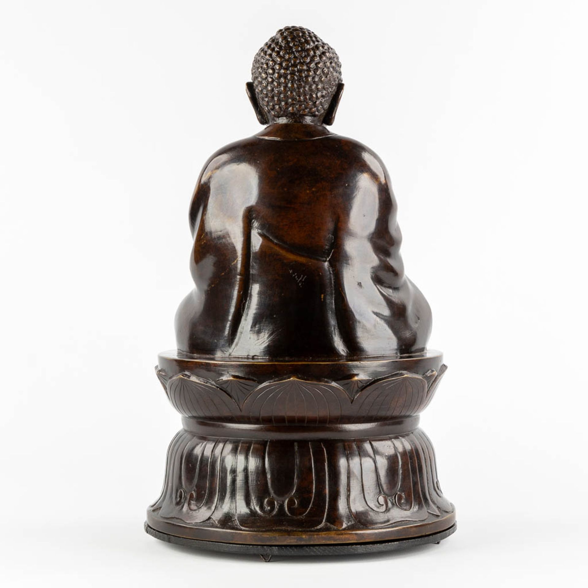 A Buddha seated on a lotus flower, patinated bronze. (H:50 x D:30 cm) - Image 5 of 10