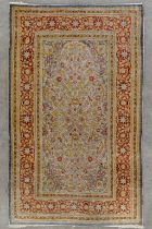 An Oriental hand-made carpet, Hereke. Silk. (L:143 x W:88 cm)