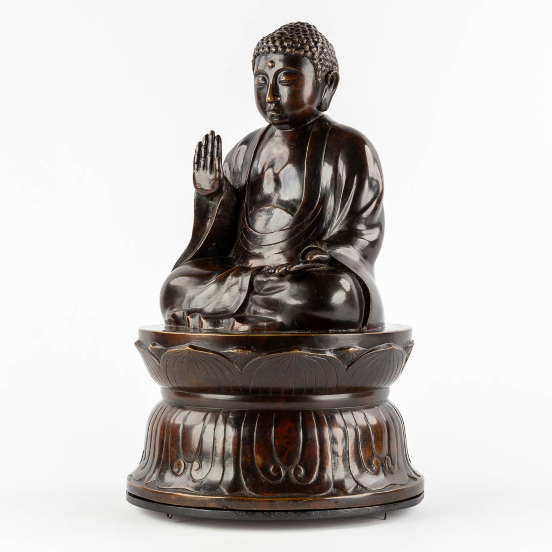 A Buddha seated on a lotus flower, patinated bronze. (H:50 x D:30 cm) - Image 3 of 10