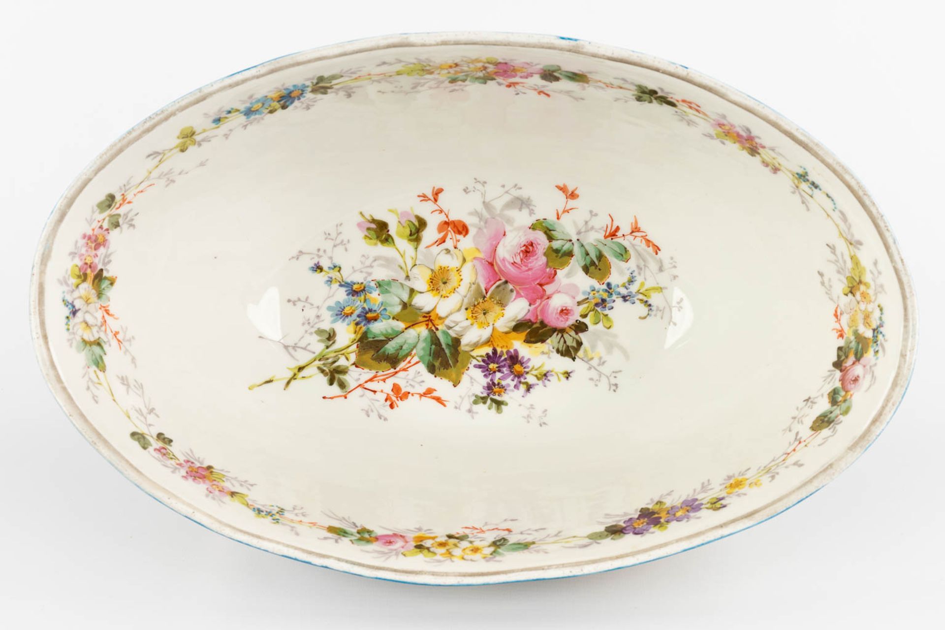 A large bowl, blue glaze with hand-painted decor, probably Limoges. (L:24 x W:39 x H:14 cm) - Image 7 of 12