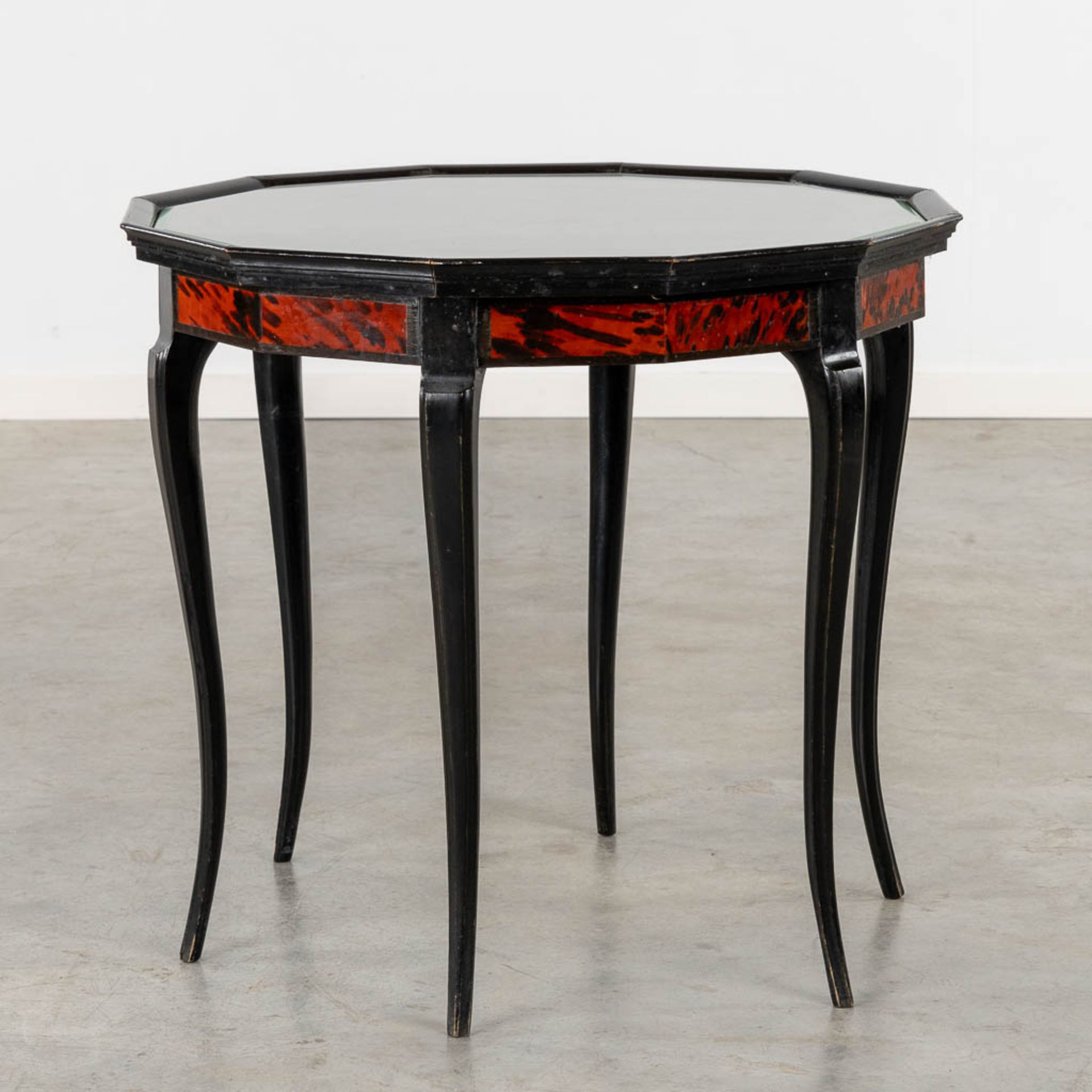 Maison Franck, Antwerp, an octagonal side table, tortoise shell and ebonised wood. (H:65 x D:72 cm) - Image 6 of 8