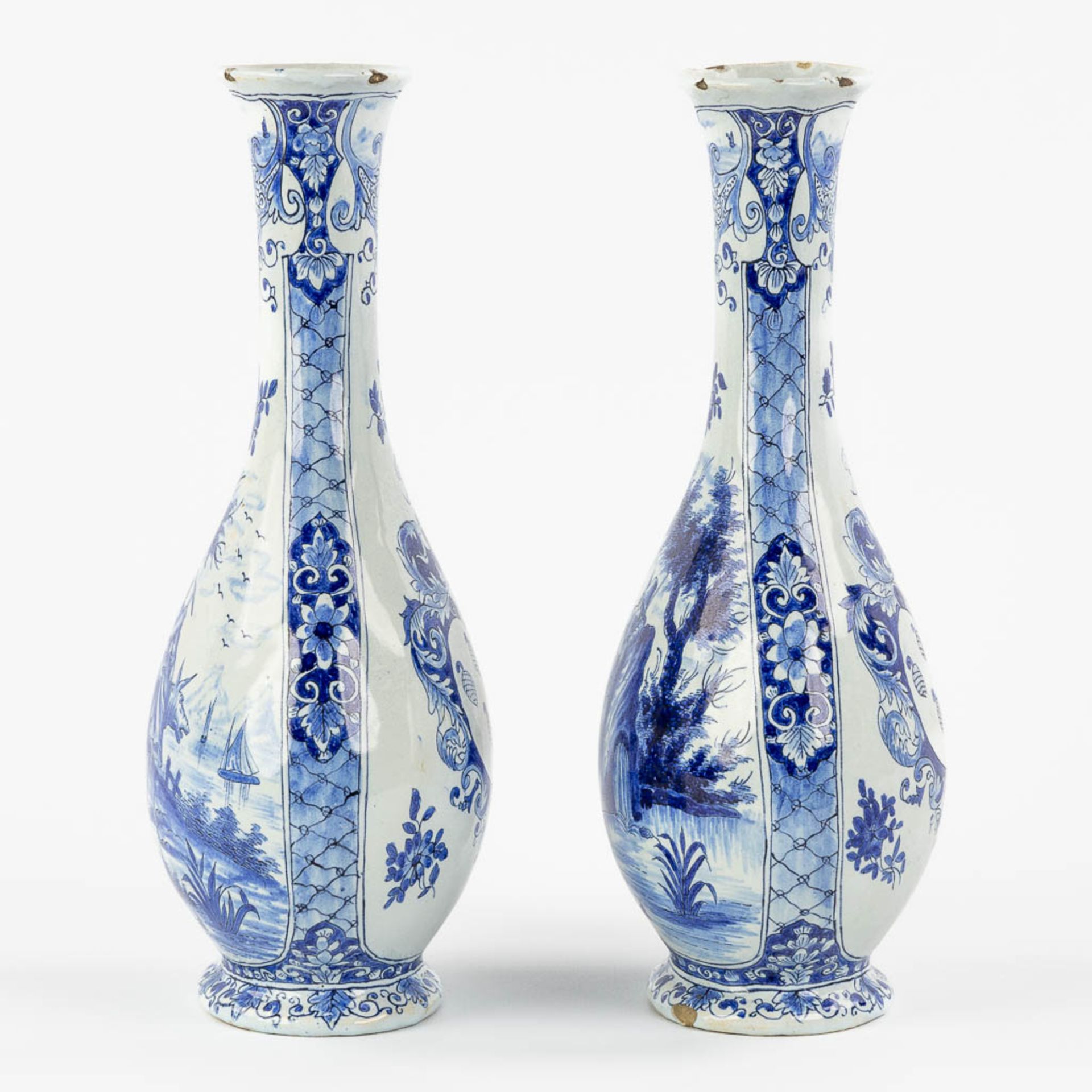 Geertrui Verstelle, Delft, a pair of vases with a landscape decor. Mid 18th C. (L:9 x W:14 x H:26,5 - Image 6 of 15